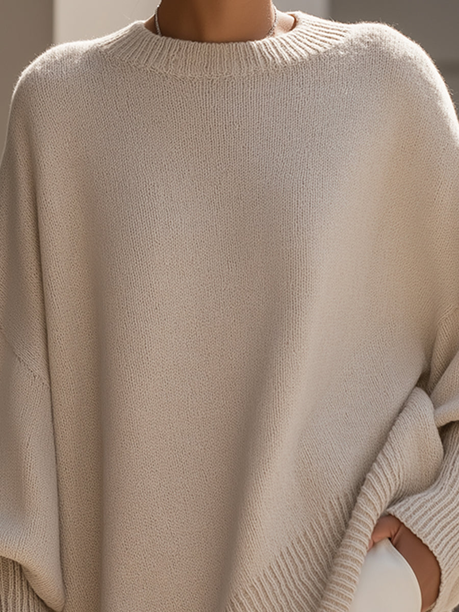 Women's oversized poncho jumper with asymmetric hem
