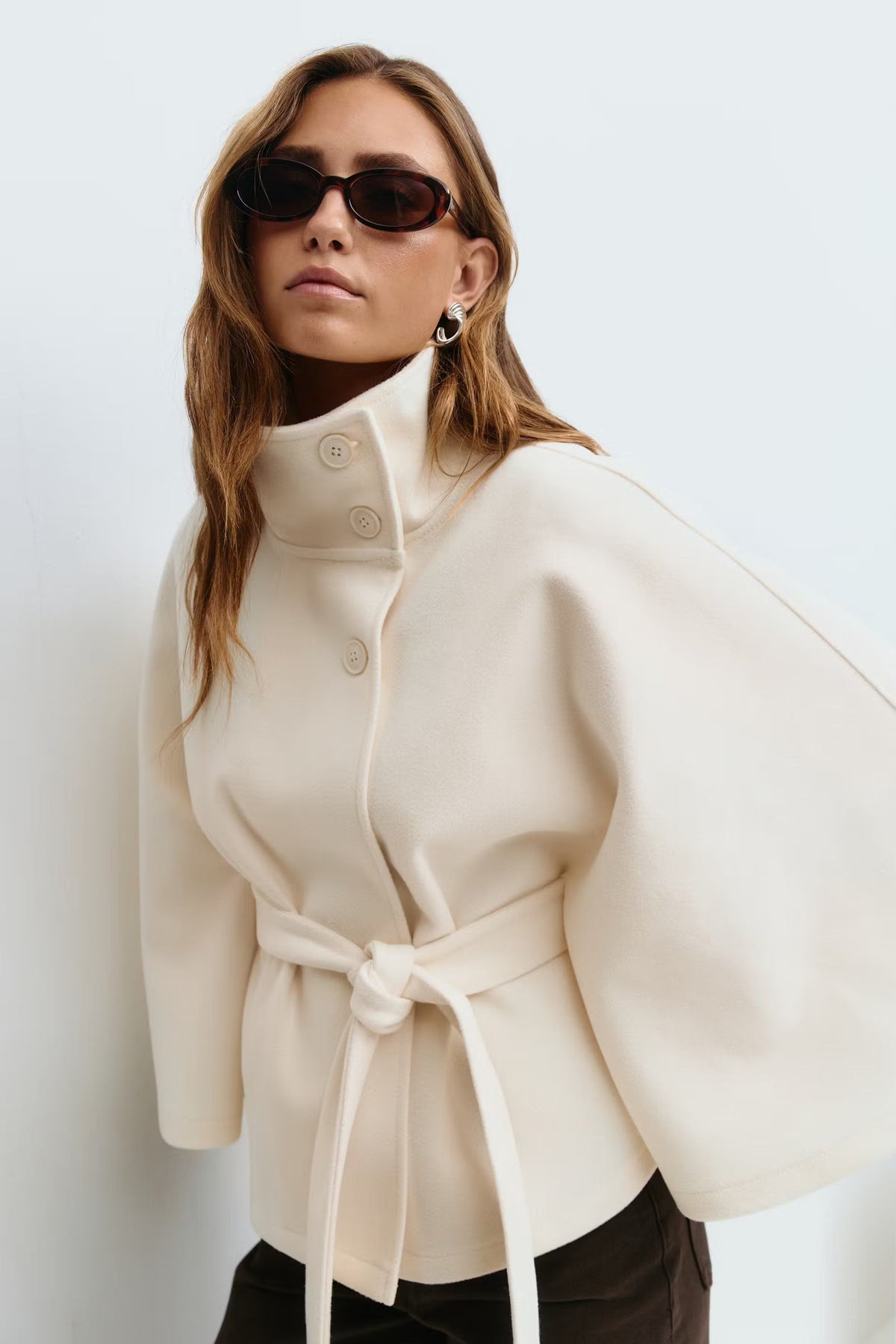 Women's belted cape coat with buttoned high collar
