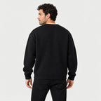 Men's waffle knit Henley jumper in Black | Iwerne – back view