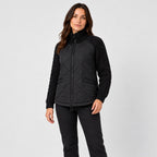 Women's quilted jacket with cable knit sleeves in Black | Luxulyan – side view