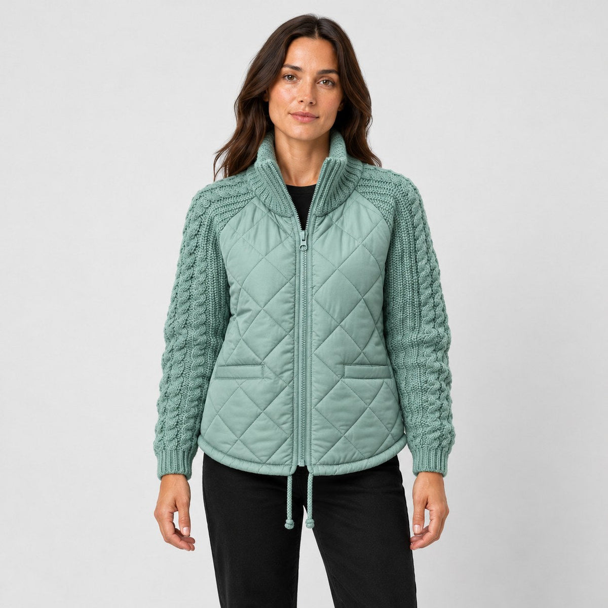 Women's quilted jacket with cable knit sleeves in Mint Green | Luxulyan – front view