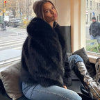 Women's loose-fit plush-lined faux fur jacket