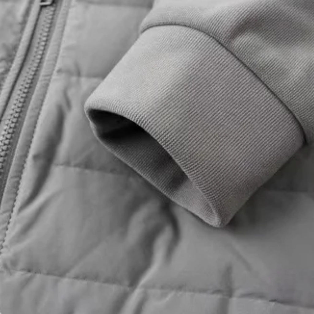 Men's hooded puffer jacket with quilted panels