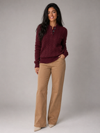 Women's cable knit jumper with buttoned neck