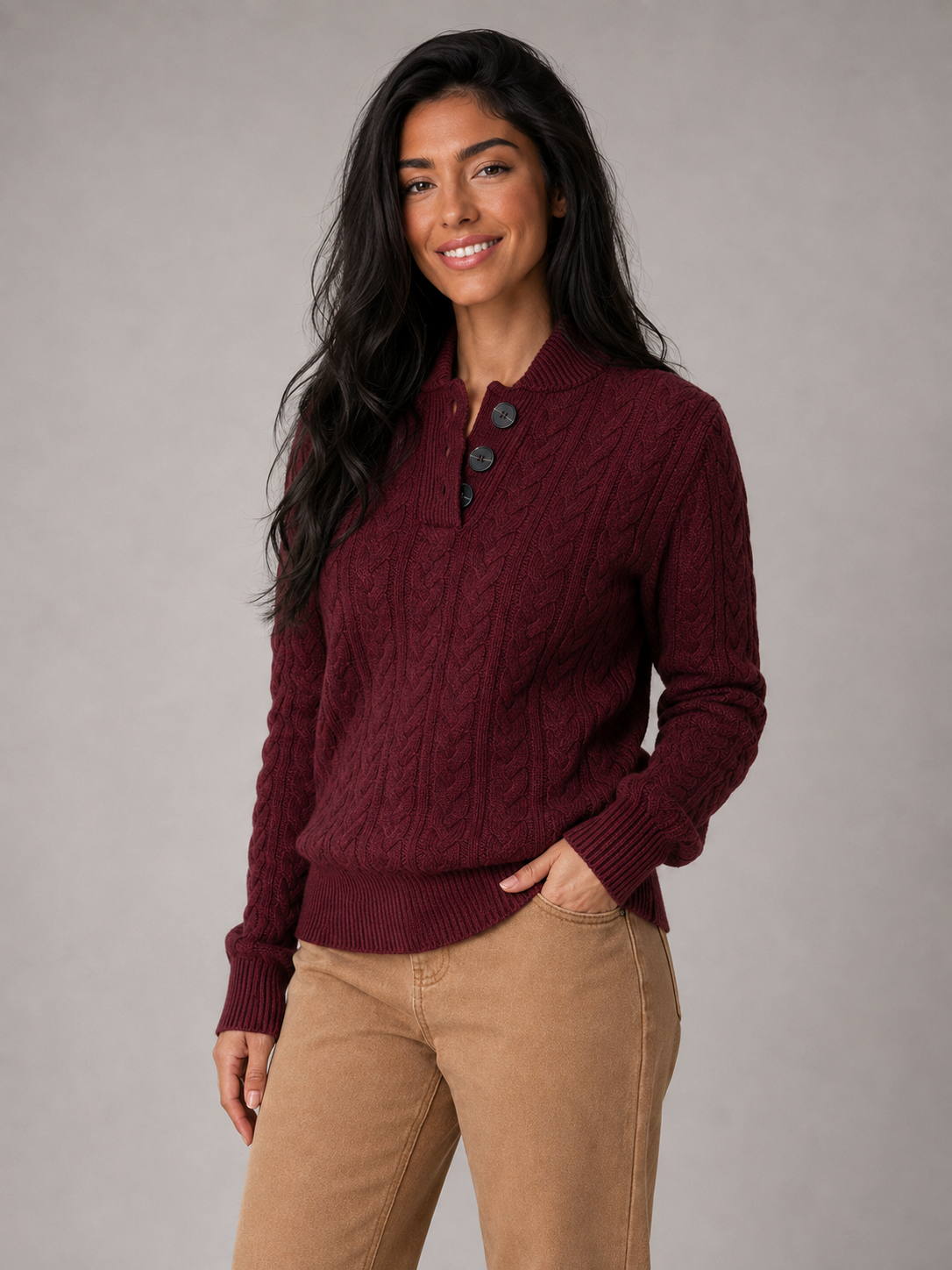 Women's cable knit jumper with buttoned neck