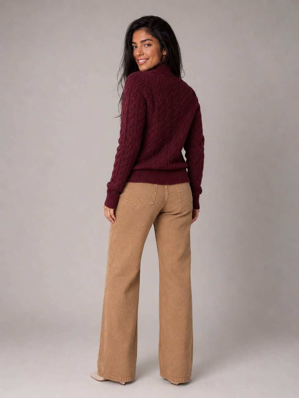 Women's cable knit jumper with buttoned neck