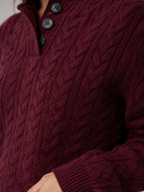 Women's cable knit jumper with buttoned neck