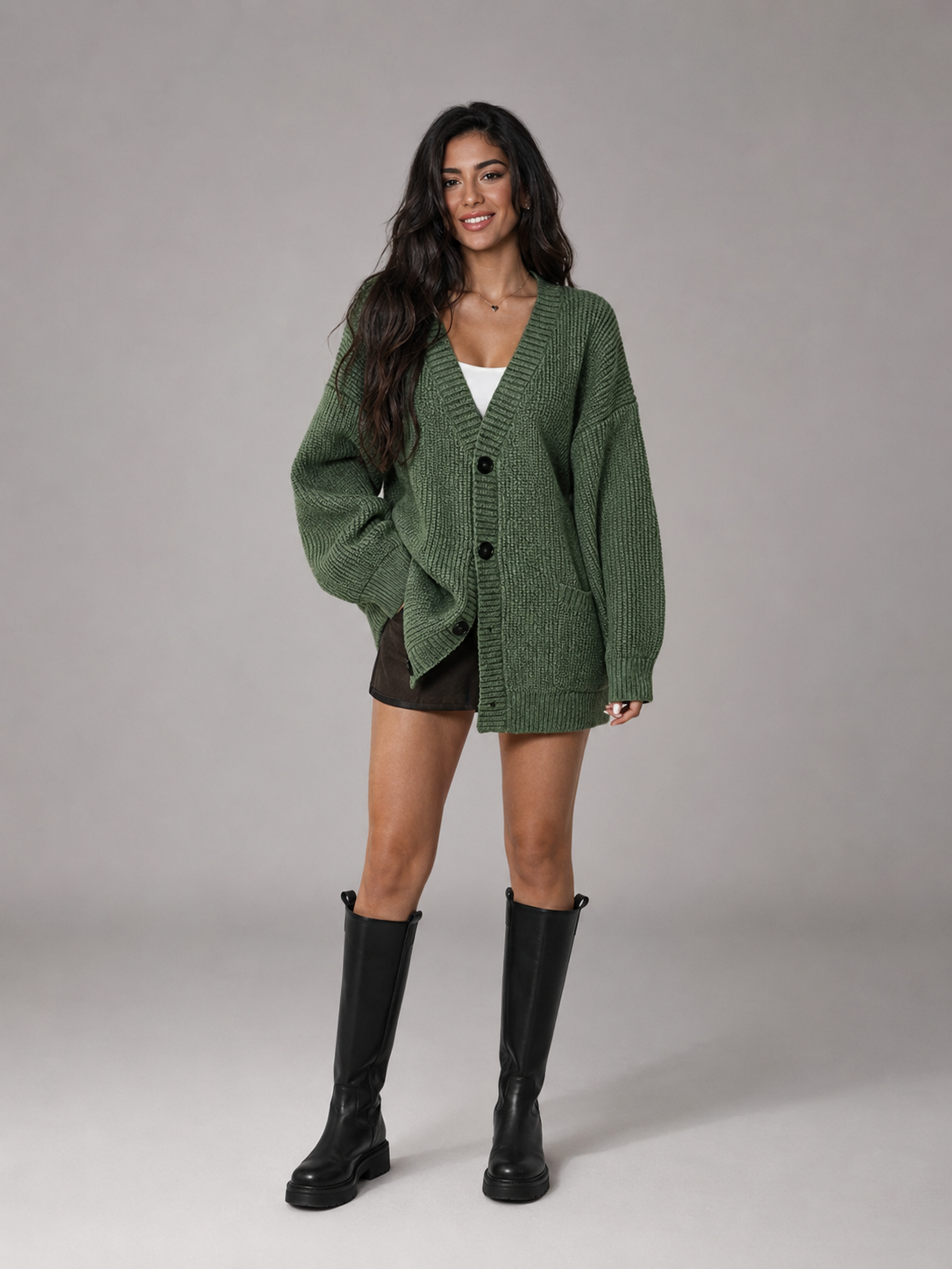 Women's oversized chunky knit cardigan with a V-neck and pockets