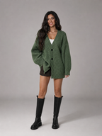 Women's oversized chunky knit cardigan with a V-neck and pockets
