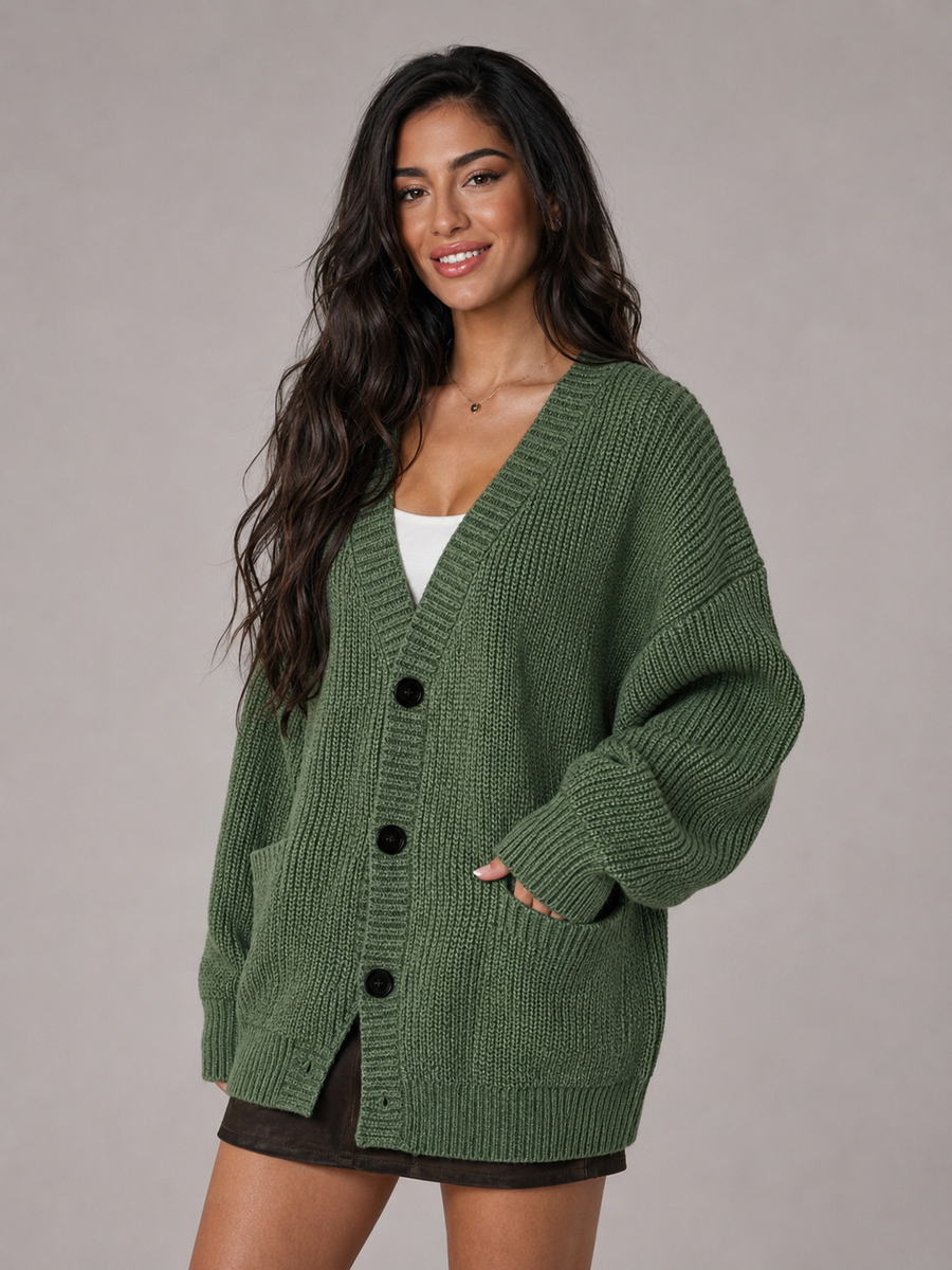 Women's oversized chunky knit cardigan with a V-neck and pockets
