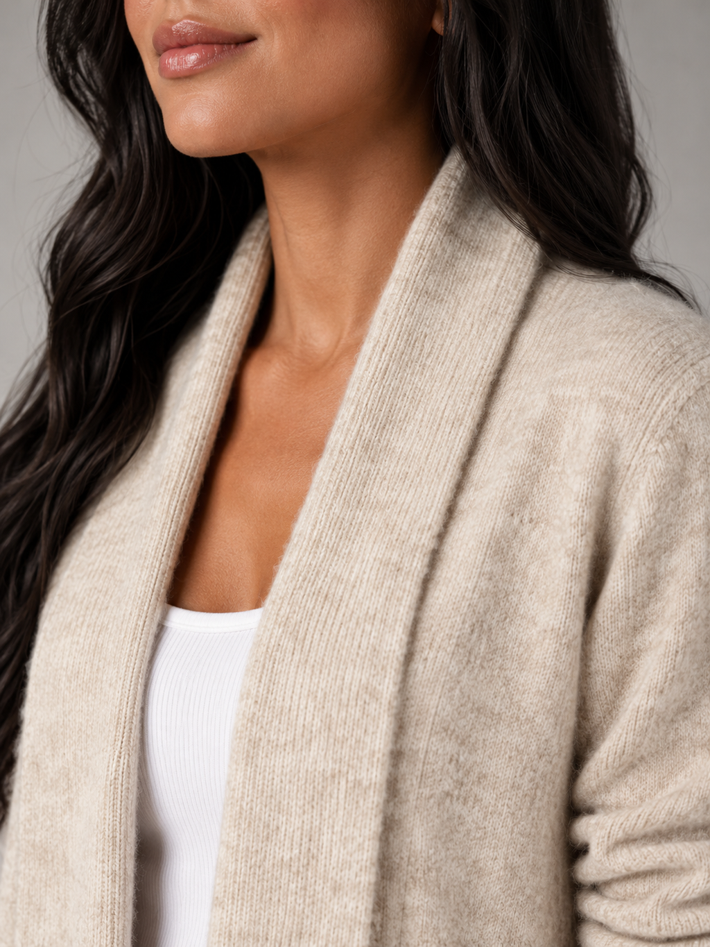Women's shawl collar cardigan with a button-tab waist