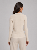 Women's ribbed knit polo top with collar and button placket