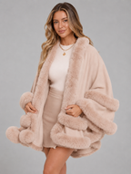Women's cape cardigan with faux fur trim