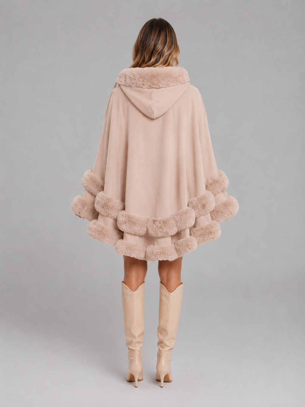 Women's cape cardigan with faux fur trim
