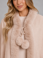 Women's cape cardigan with faux fur trim