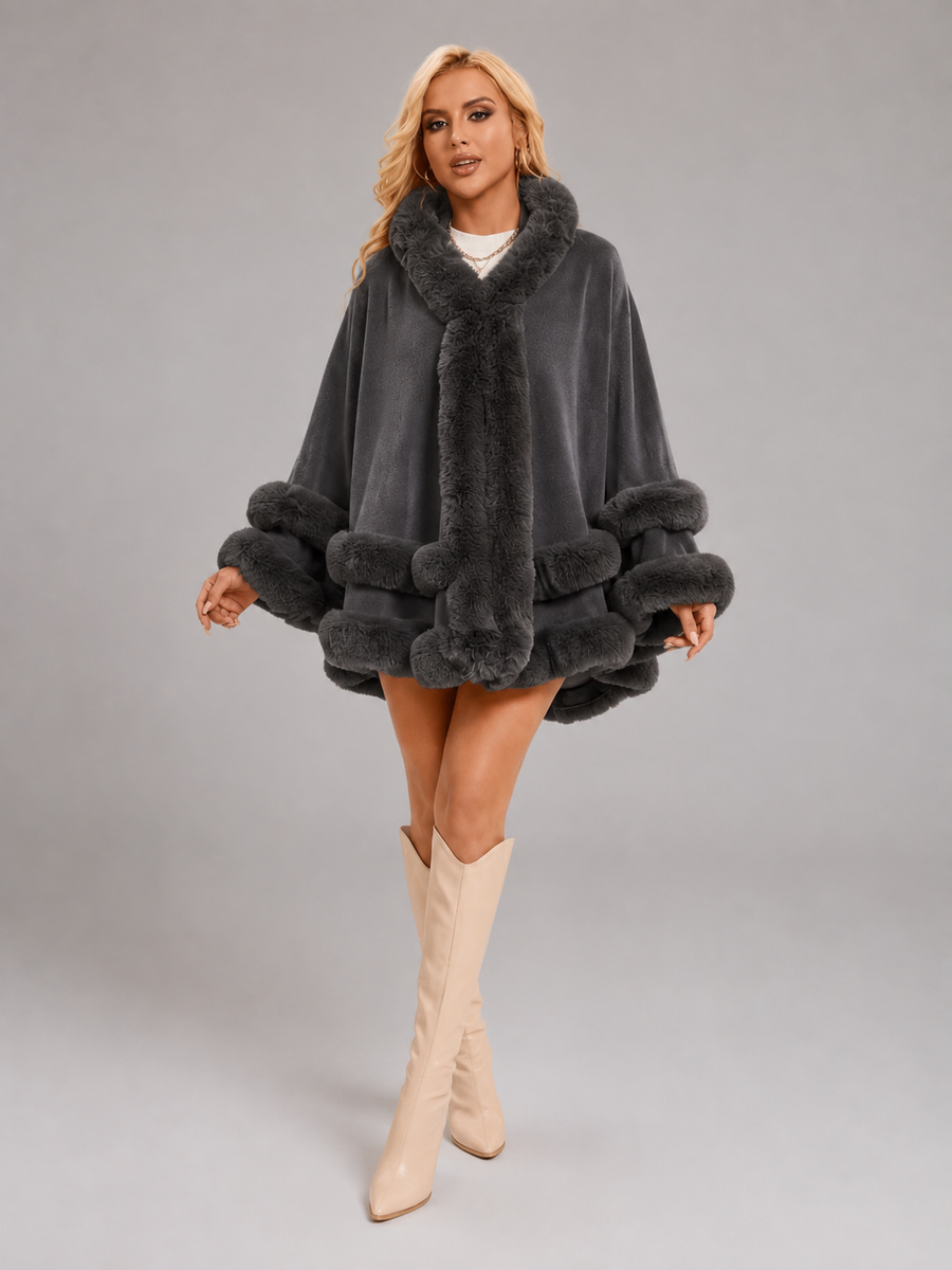 Women's cape cardigan with faux fur trim