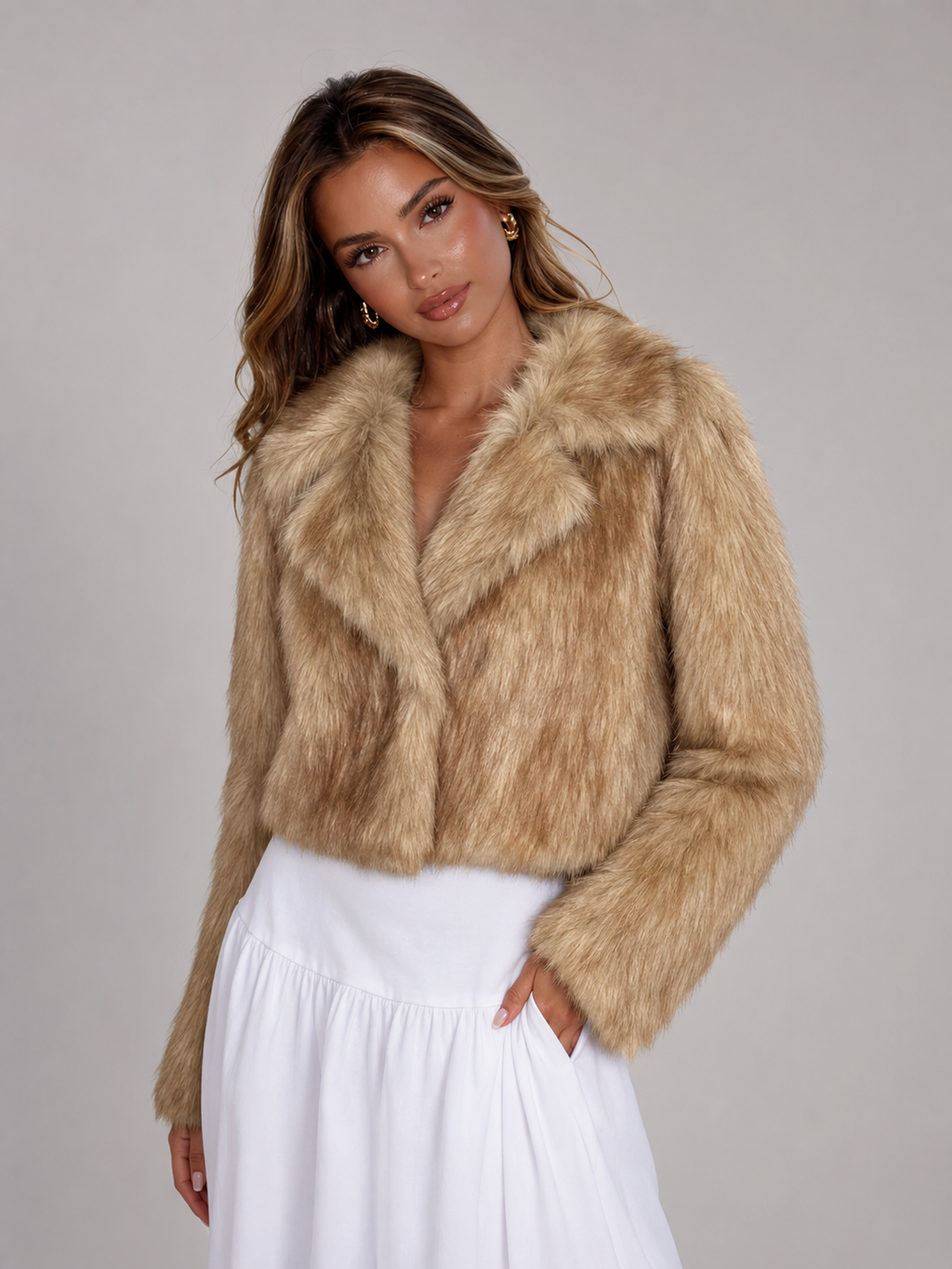 Women's cropped faux fur jacket with a wide tailored collar