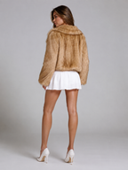 Women's cropped faux fur jacket with a wide tailored collar