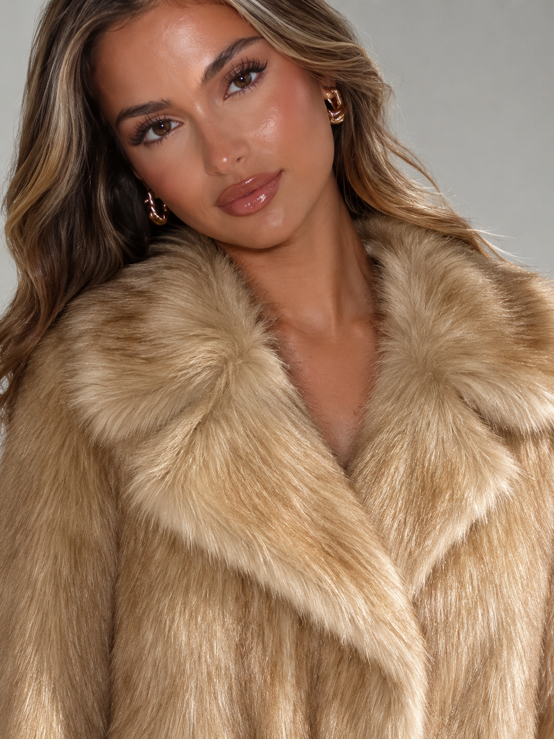 Women's cropped faux fur jacket with a wide tailored collar