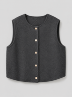 Women's sleeveless knitted waistcoat with a button front