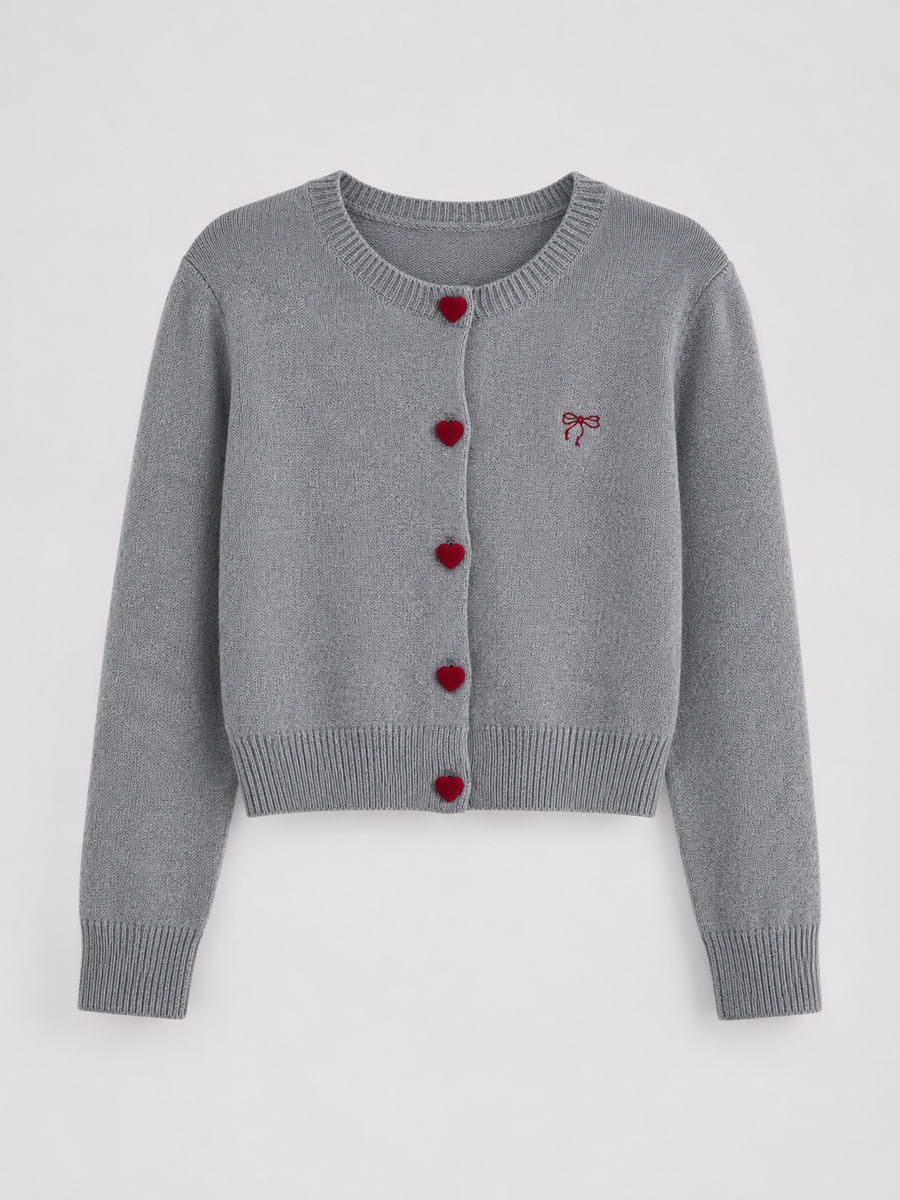 Women's knit cardigan with an embroidered bow and heart-shaped buttons