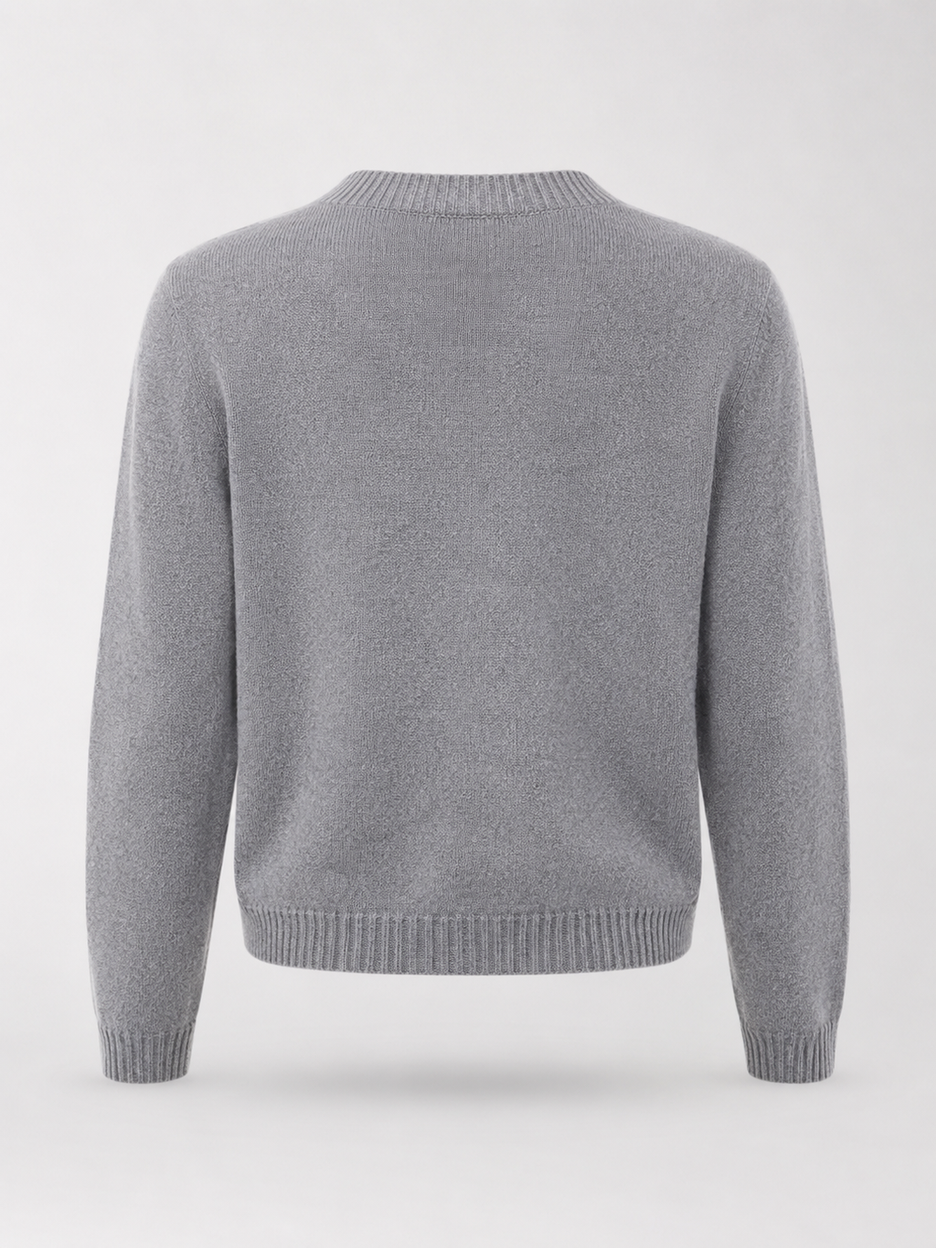 Women's knit cardigan with an embroidered bow and heart-shaped buttons