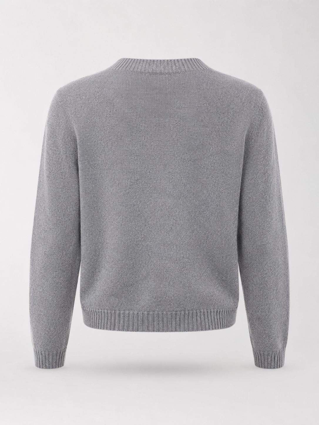 Women's knit cardigan with an embroidered bow and heart-shaped buttons