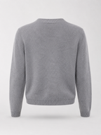 Women's knit cardigan with an embroidered bow and heart-shaped buttons