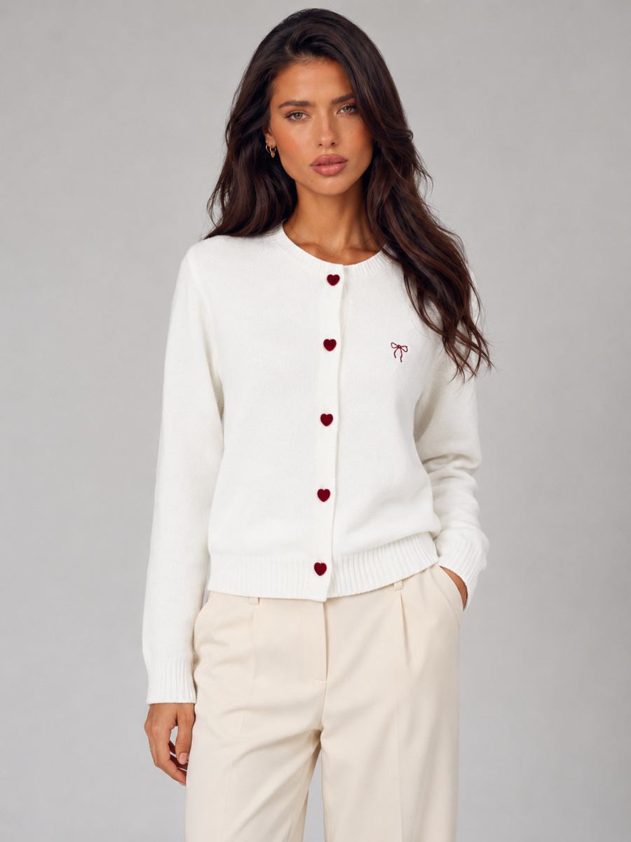 Women's knit cardigan with an embroidered bow and heart-shaped buttons