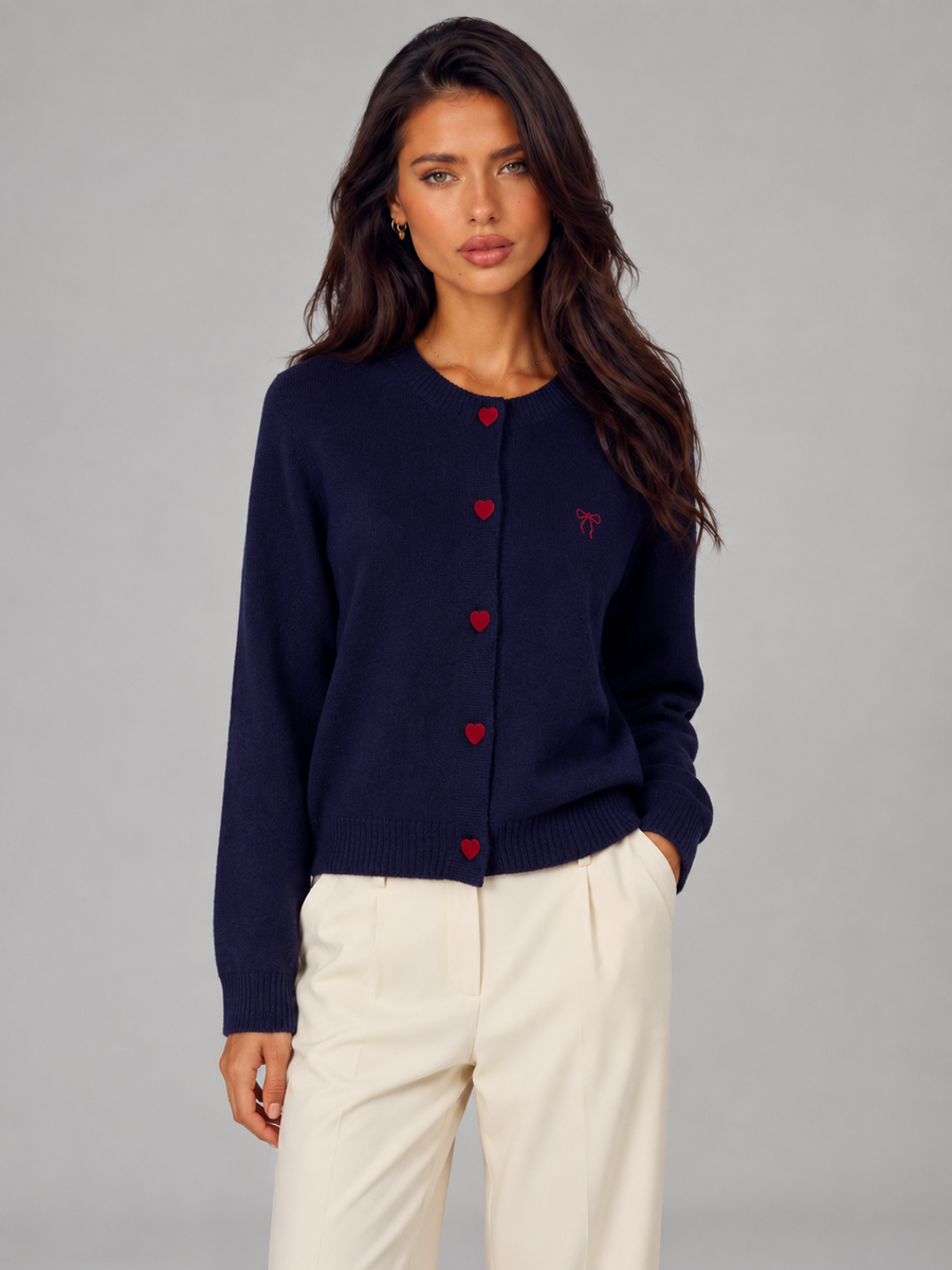 Women's knit cardigan with an embroidered bow and heart-shaped buttons