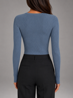 Women's fitted ribbed henley top with a button placket