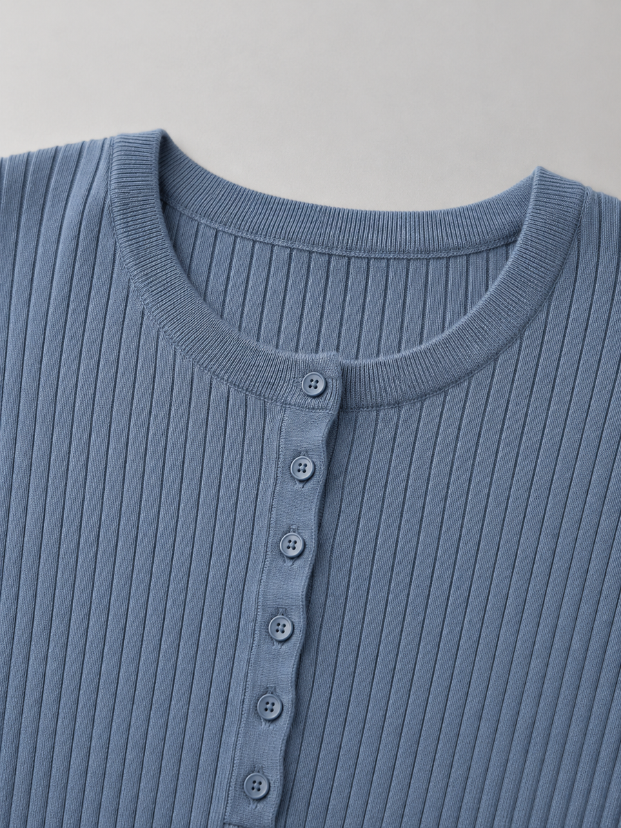 Women's fitted ribbed henley top with a button placket