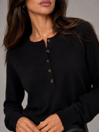 Women's fine-knit henley jumper with a buttoned placket