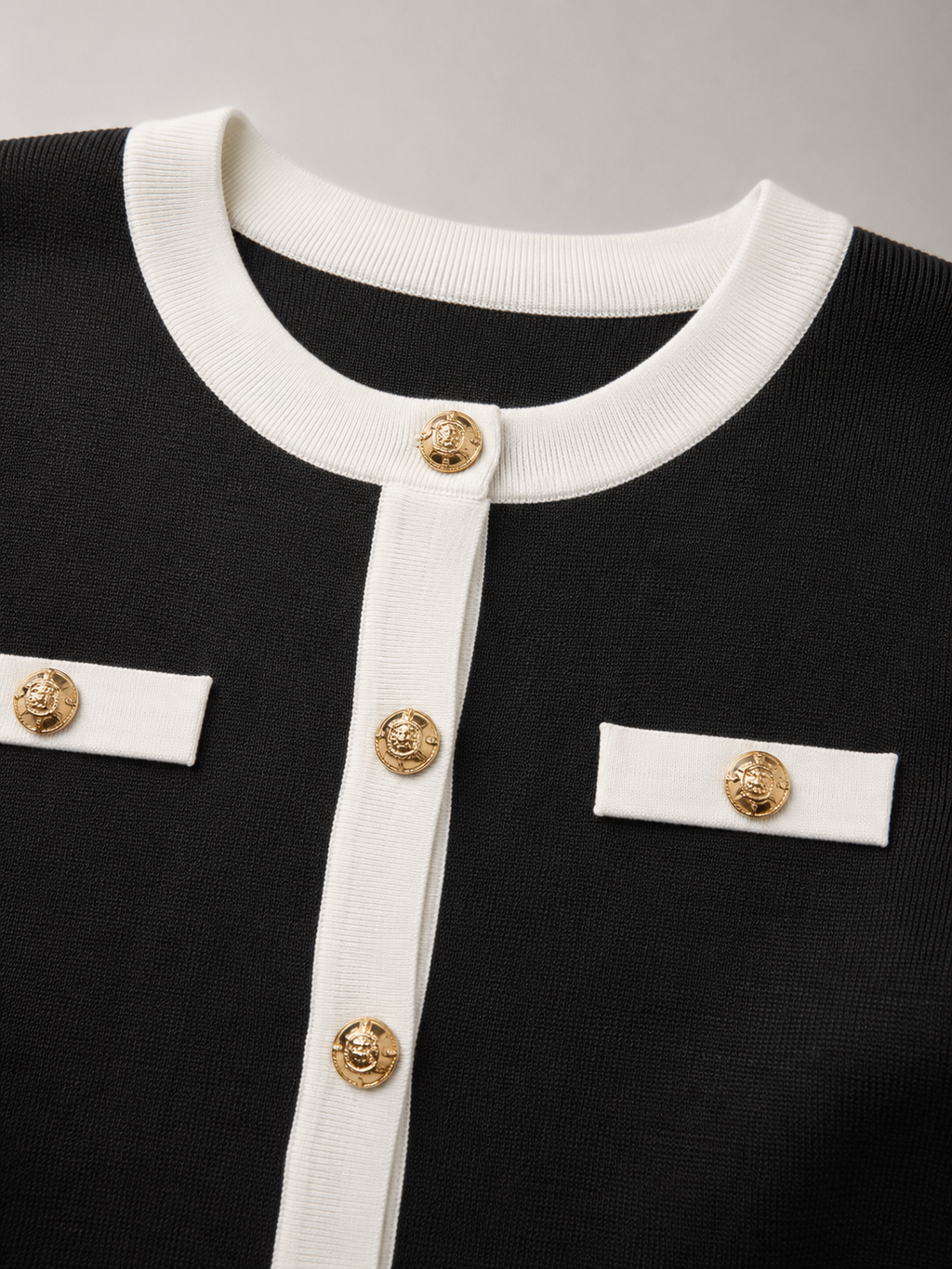 Women's knitted mini dress with contrast trim and gold-tone buttons