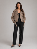 Women's oversized faux leather biker jacket with a belt