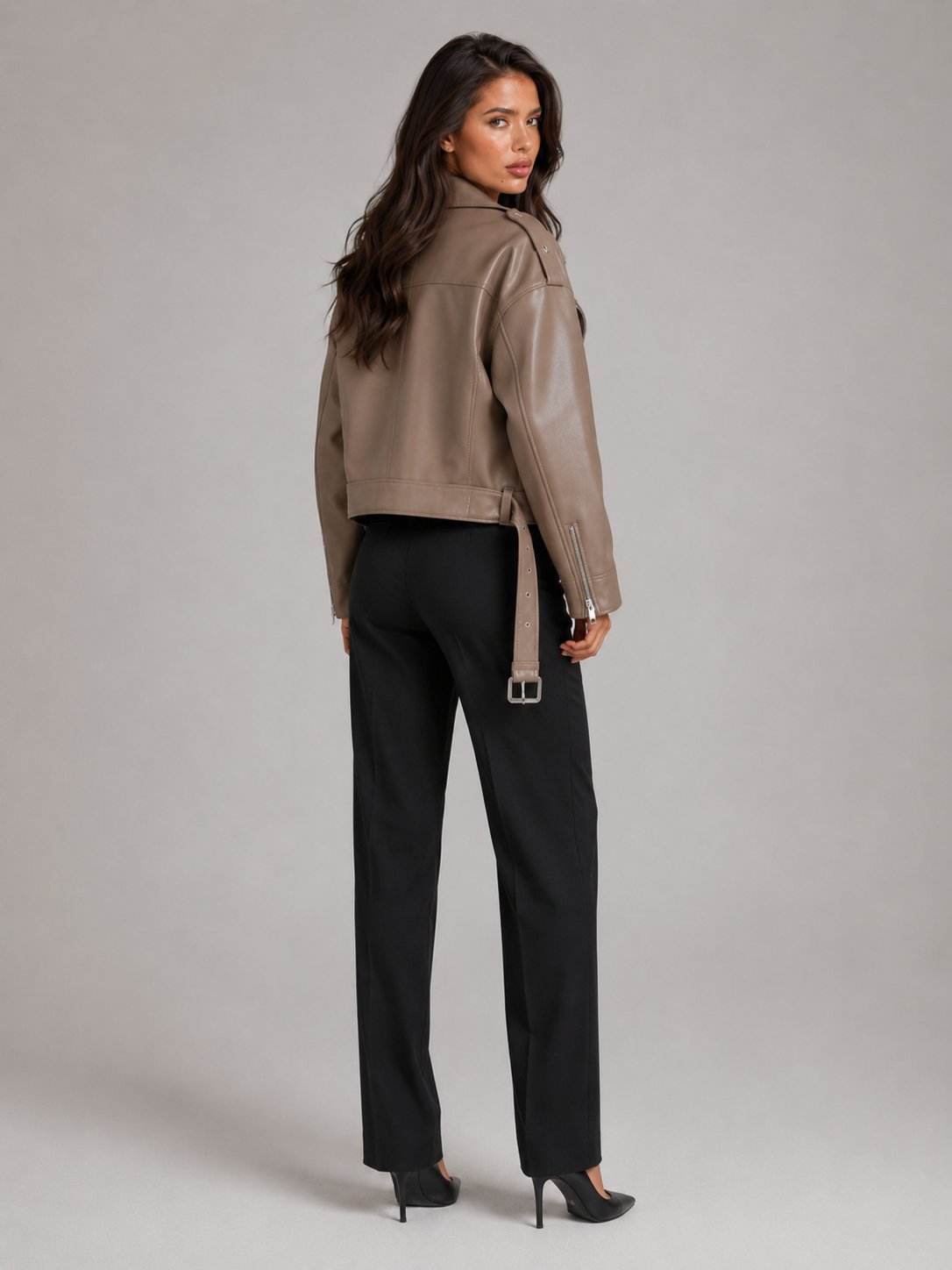 Women's oversized faux leather biker jacket with a belt