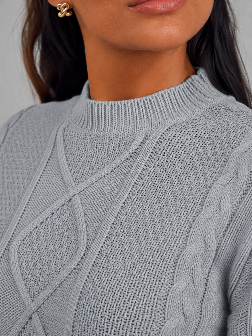 Women's cropped cable knit jumper with a mock neck