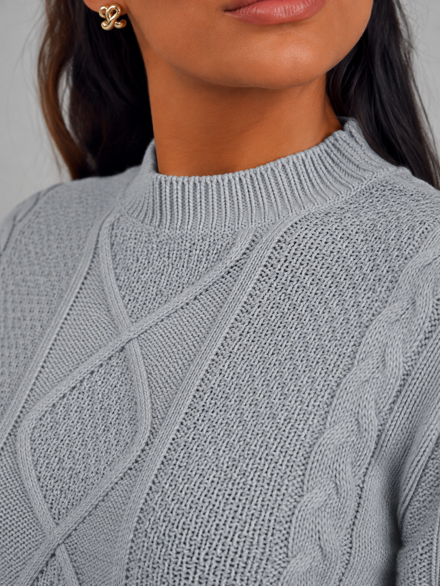 Women's cropped cable knit jumper with a mock neck