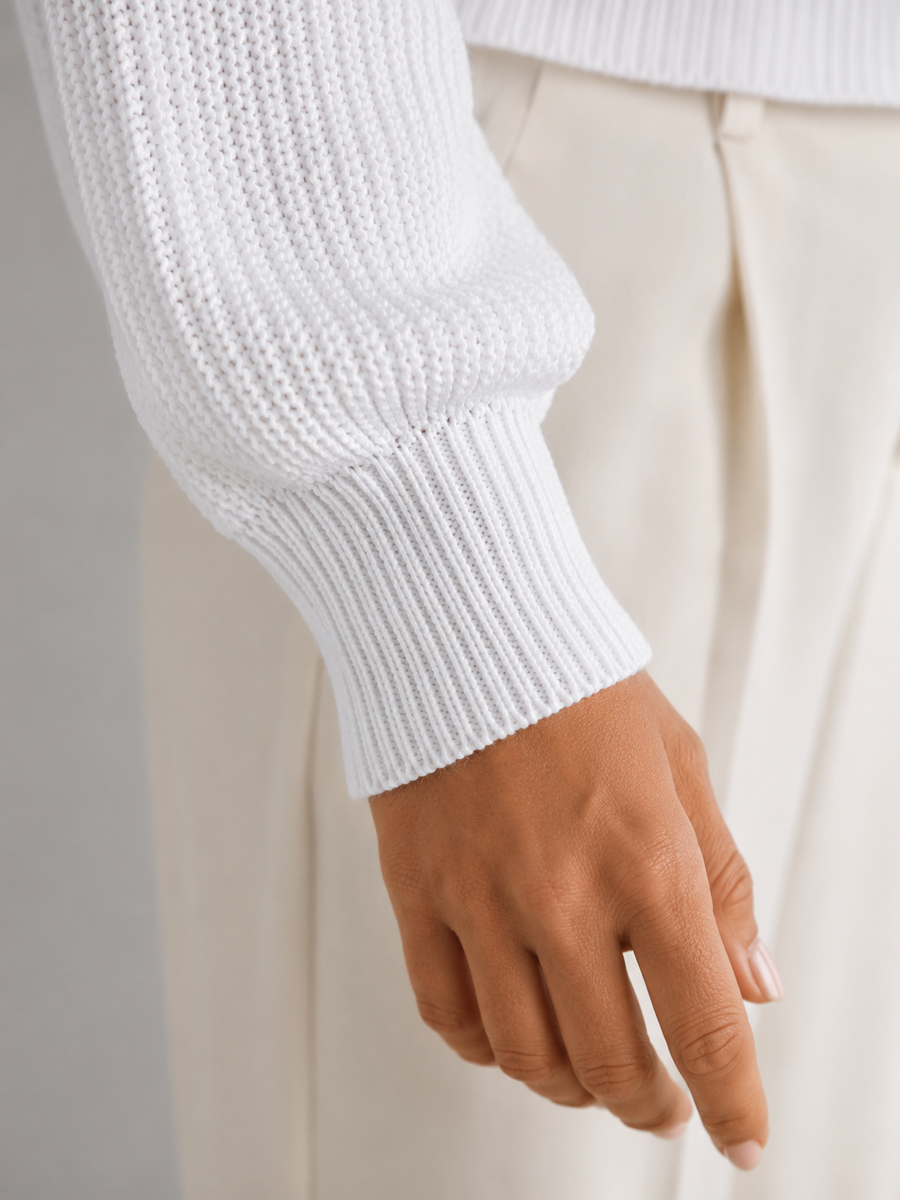Women's cable knit jumper with lantern sleeves and a ribbed waist