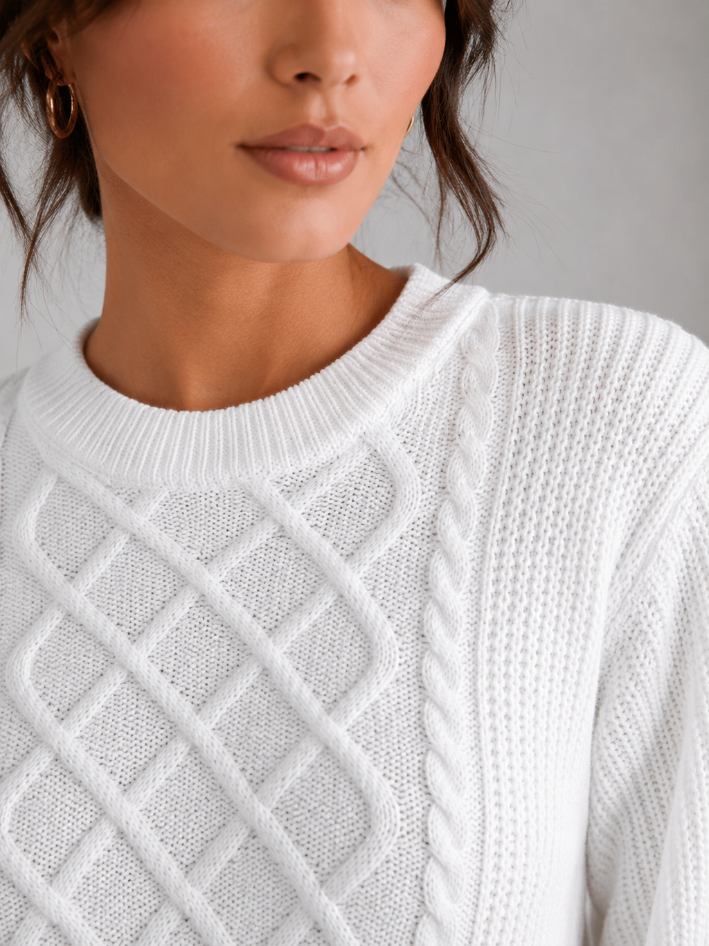 Women's cable knit jumper with lantern sleeves and a ribbed waist