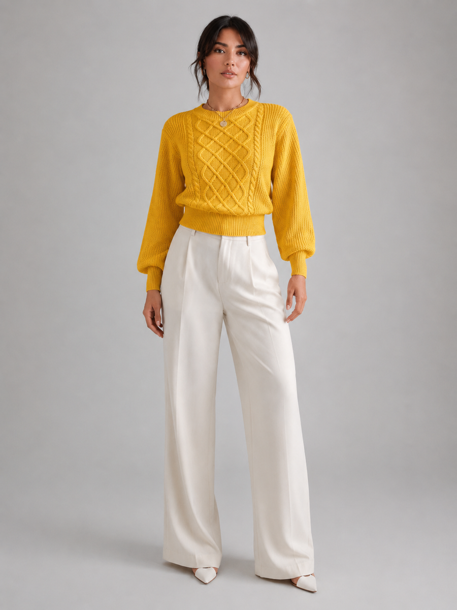 Women's cable knit jumper with lantern sleeves and a ribbed waist