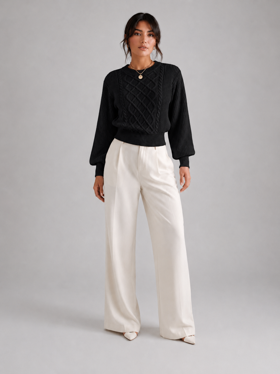 Women's cable knit jumper with lantern sleeves and a ribbed waist