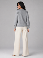 Women's textured jumper with an asymmetric shawl collar