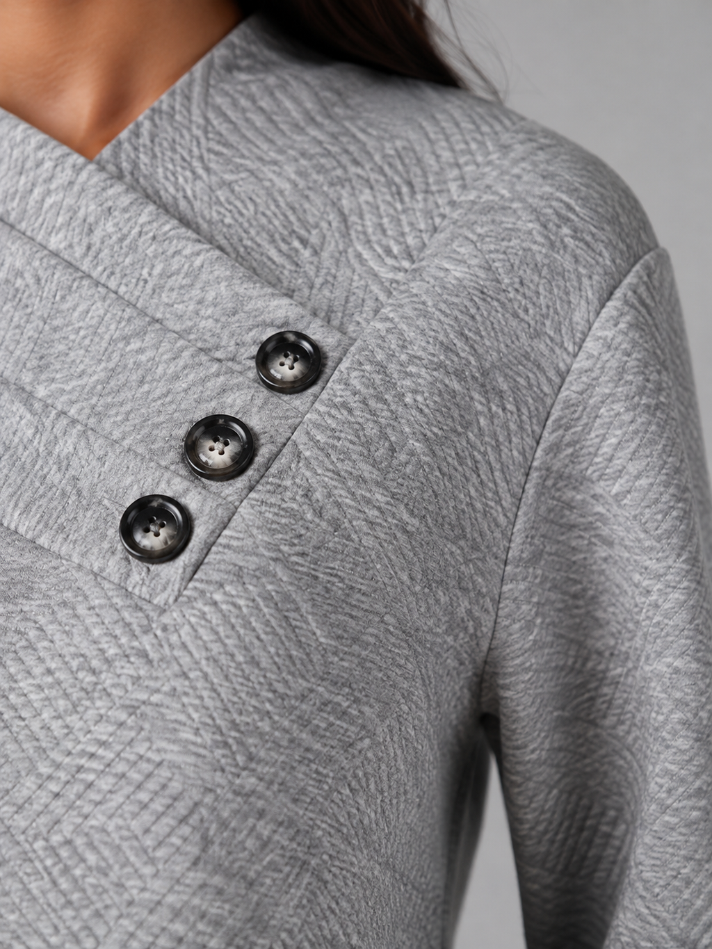 Women's textured jumper with an asymmetric shawl collar