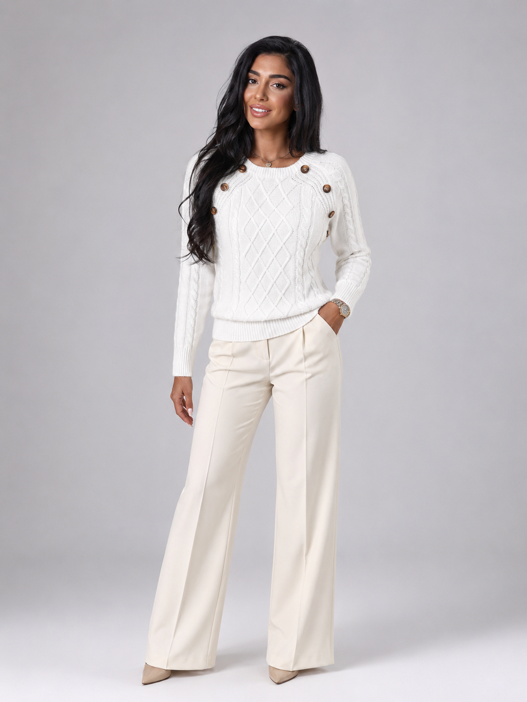 Women's cable knit jumper with buttons at the shoulder seam