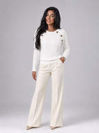 Women's cable knit jumper with buttons at the shoulder seam