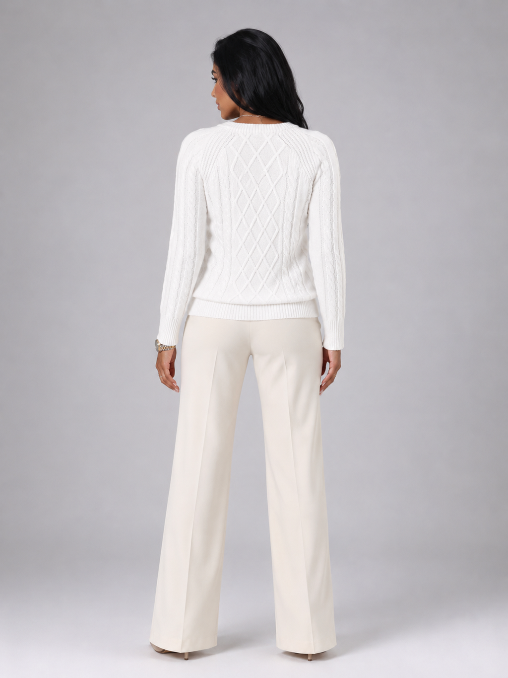 Women's cable knit jumper with buttons at the shoulder seam