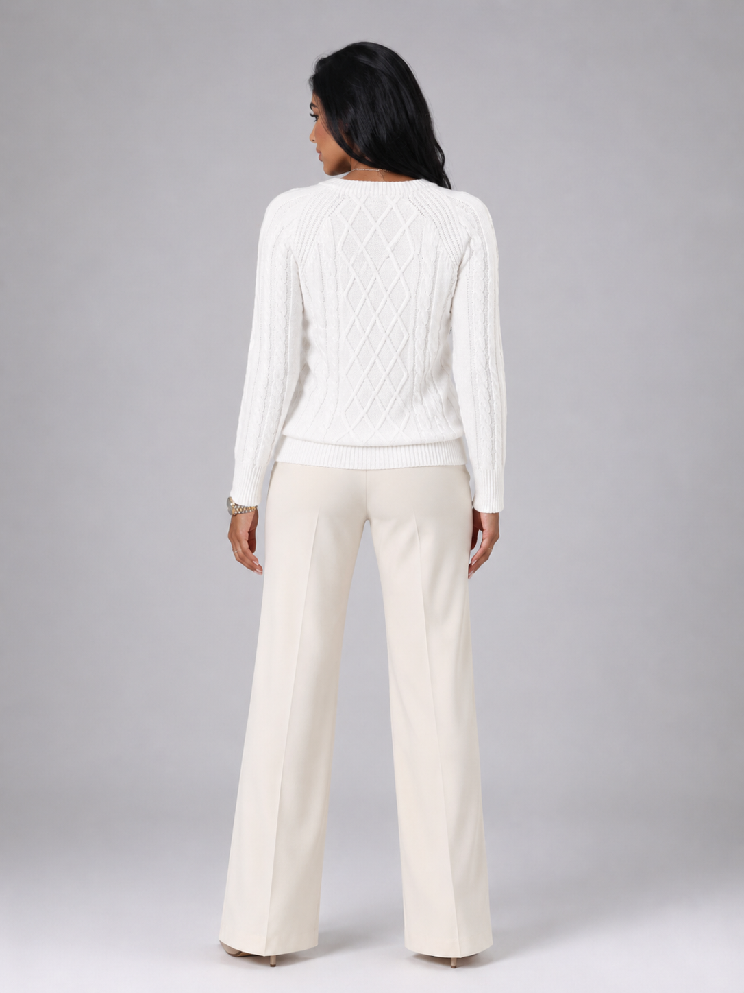 Women's cable knit jumper with buttons at the shoulder seam