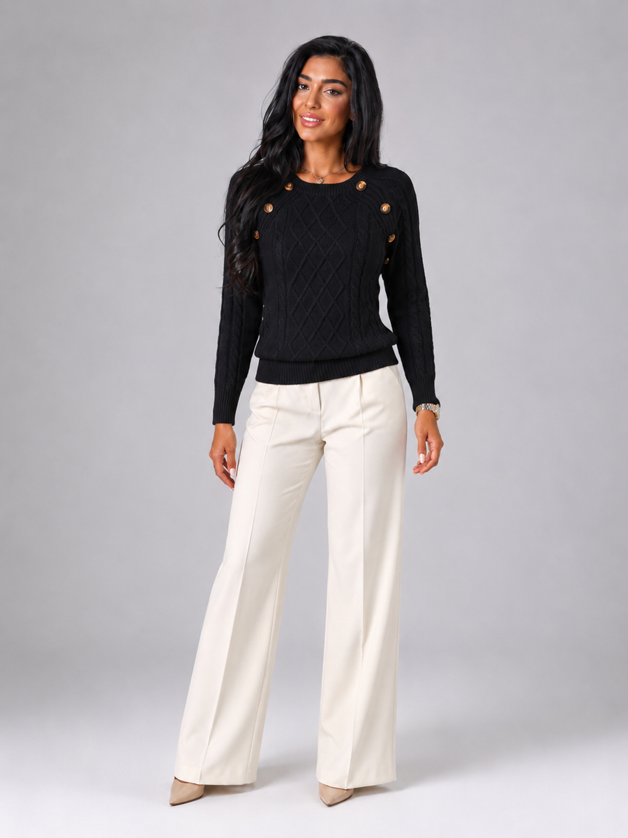 Women's cable knit jumper with buttons at the shoulder seam