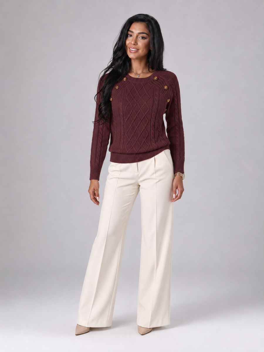 Women's cable knit jumper with buttons at the shoulder seam